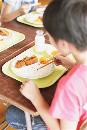 schoolchild eat - Children Having Lunch Stock Photo - Rights-Managed, Code: 859-03860911