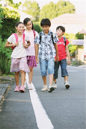 friends sidewalk walk - Children With School Bag Walking In Street Stock Photo - Rights-Managed, Code: 859-03860952