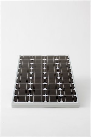 ecology and technology - Panneau solaire sur fond blanc Photographie de stock - Rights-Managed, Code: 859-03885086