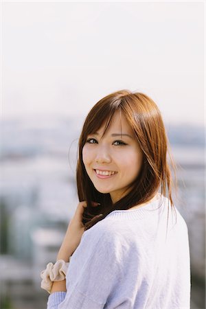 Young Smiling Japanese Women Looking Back Stock Photo - Rights-Managed, Code: 859-03885287