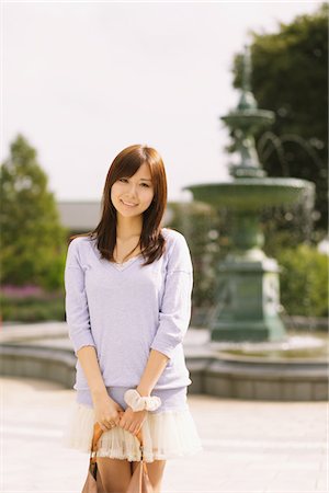 Japanese Women Posing And Holding Bag Stock Photo - Rights-Managed, Code: 859-03885303