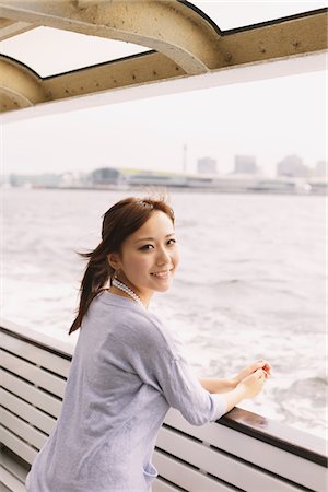 Japanese Women Standing on Boat Stock Photo - Rights-Managed, Code: 859-03885375