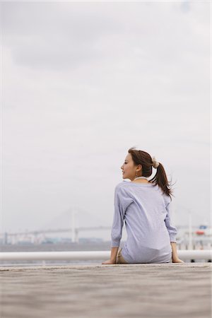 simsearch:859-03860564,k - Woman Sitting And Looking Away Stock Photo - Rights-Managed, Code: 859-03885382