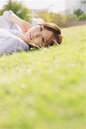 simsearch:859-03860564,k - Japanese Women Lying On Green Ground Stock Photo - Rights-Managed, Code: 859-03885401