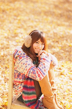 Japanese Women Sitting On Chair And Smiling Stock Photo - Rights-Managed, Code: 859-03885427