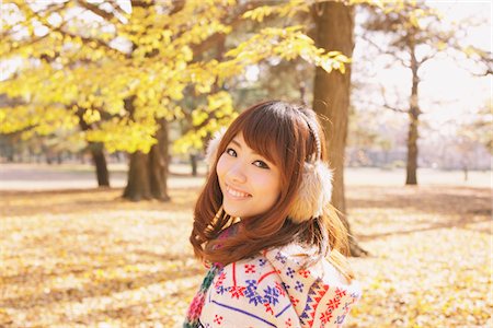 Japanese Women Smiling And Looking Back Stock Photo - Rights-Managed, Code: 859-03885450