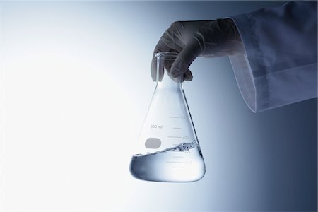 erlenmeyer flask photography - Scientist Holding Flask Stock Photo - Rights-Managed, Code: 859-03982253