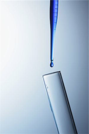 experiment - Dropping Liquid Into Test Tube Stock Photo - Rights-Managed, Code: 859-03982269