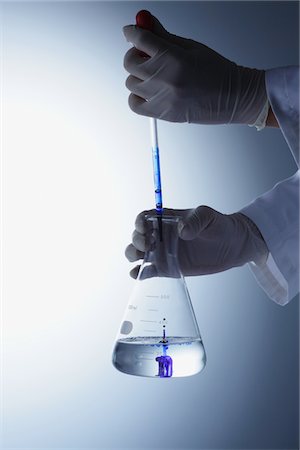erlenmeyer flask and beaker - Scientist Holding Flask Stock Photo - Rights-Managed, Code: 859-03982261