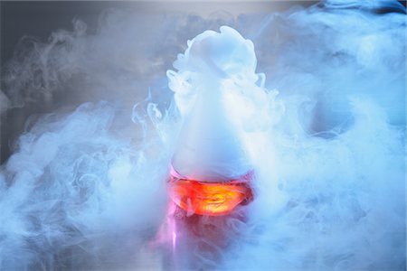 red liquid - Smoke Escaping From Flask Stock Photo - Rights-Managed, Code: 859-03982303