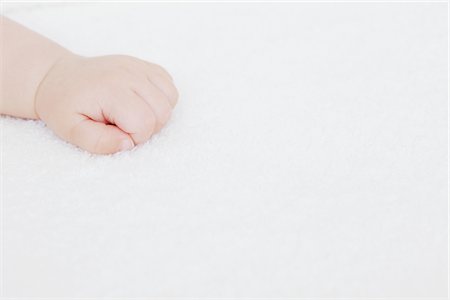 Hand Of Baby Foto de stock - Con derechos protegidos, Código: 859-03982689