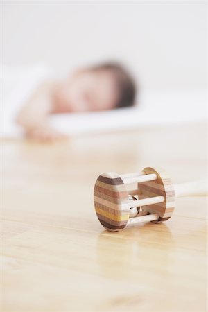 sleeping japanese baby - Baby Sleeping, Toy In Foreground Stock Photo - Rights-Managed, Code: 859-03982701