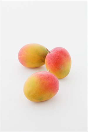 Apple Mangoes On White Background Foto de stock - Con derechos protegidos, Código: 859-03982991