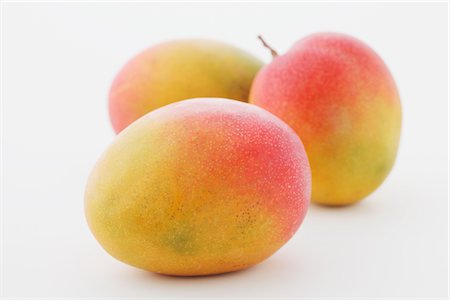 Apple Mangoes On White Background Foto de stock - Con derechos protegidos, Código: 859-03982992