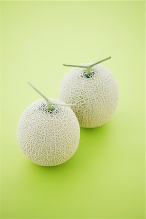 simsearch:614-02639882,k - Two Melons (Earl's Melon) On Green Background Foto de stock - Con derechos protegidos, Código: 859-03983002