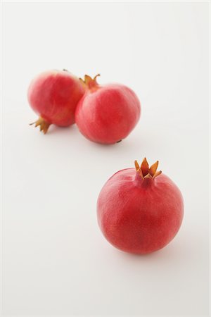 pomegranates not people not illustration - Three Pomegranates On White Background Stock Photo - Rights-Managed, Code: 859-03983049