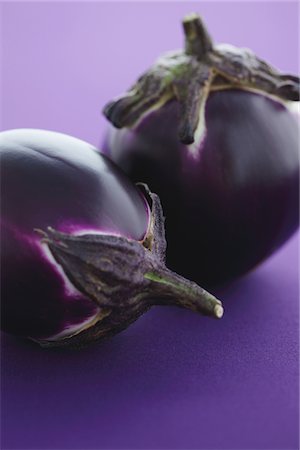 stem (botanical) - Italian Eggplants On Purple Background Stock Photo - Rights-Managed, Code: 859-03983146