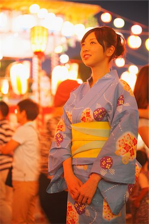 simsearch:400-05383537,k - Woman Wearing Yukata Enjoying Matsuri Festival Stock Photo - Rights-Managed, Code: 859-03983241