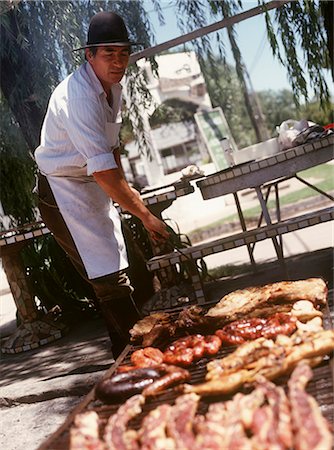 Man At Barbecue,Buenos Aires,Argentina Stock Photo - Rights-Managed, Code: 851-02958603