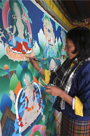 Woman patting picture,Paro,Bhutan Stock Photo - Rights-Managed, Code: 851-02958833