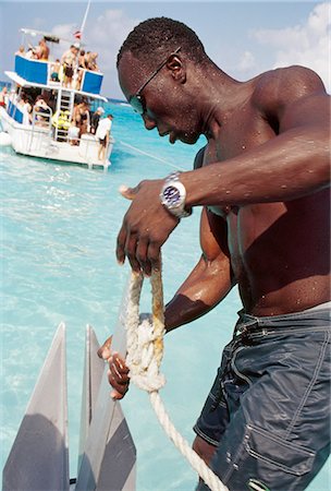 Homme tirant d'ancrage, île de Grand Cayman Photographie de stock - Rights-Managed, Code: 851-02958990