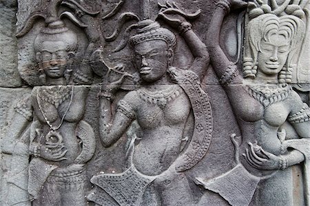 Ornate carvings on walls of Bayon temple,Angkor,Siem Reap,Cambodia Stock Photo - Rights-Managed, Code: 851-02959017