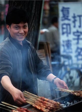 street food stall - Kebab maker in central Beijing,Beijing,China Stock Photo - Rights-Managed, Code: 851-02959064