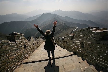 Tourist cheering on Great Wall of China,China Foto de stock - Con derechos protegidos, Código: 851-02959091