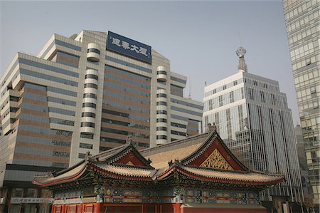 A contrast of old and new: a traditional Chinese structure beside modern skyscrapers,Beijing,China Stock Photo - Rights-Managed, Code: 851-02959093