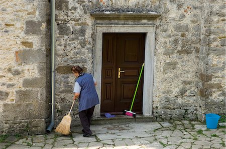 simsearch:851-02962069,k - Woman sweeping street in town of Hum,Istria,Croatia Stock Photo - Rights-Managed, Code: 851-02959302