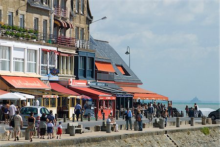 Restaurants on the seafront of Cancale with Mont St Michel behind,Brittany,France Stock Photo - Rights-Managed, Code: 851-02959671