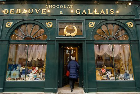 food shop windows - Woman entering Debauve & Gallais chocolate shop,St Germaine,Paris,France Stock Photo - Rights-Managed, Code: 851-02959854