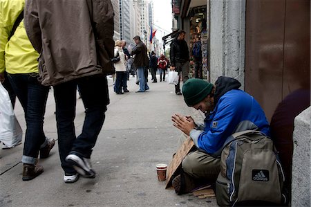 Homeless man prays for help,New York City,New York,USA Stock Photo - Rights-Managed, Code: 851-02964352