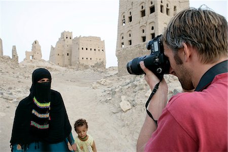 Tourist taking photos of locals,Old Marib,Yemen Stock Photo - Rights-Managed, Code: 851-02964464
