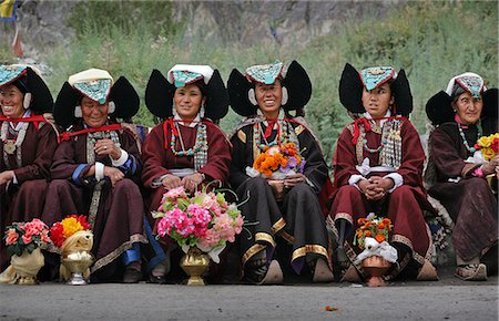 people ladakh - Buddhist Ladakhi women wearing traditional dress and hats with long plaited hair and headdress with turquoise stones and flowers,Diskyid (Disket / Diskit),Nubra Valley,Leh,Ladakh,Indian Himalayas,India Stock Photo - Rights-Managed, Code: 851-02960409