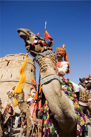 simsearch:851-02960457,k - Man riding camel at Jaisalmer festival,Rajasthan,India Foto de stock - Con derechos protegidos, Código: 851-02960458