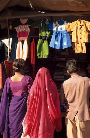street market of clothes in india - People looking at children's clothing stall,Chirawa,Shekhawati,Rajasthan,India. Stock Photo - Rights-Managed, Code: 851-02960509