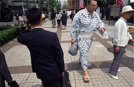 sumo wrestler - Sumo wrestler heading for the arena,Tokyo,Japan Stock Photo - Rights-Managed, Code: 851-02961243