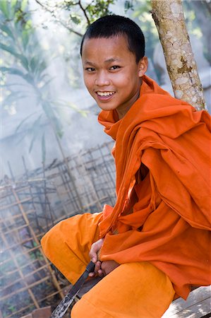 smoking teenage - Novice monk at Wat Naluang,Luang Prabang,Northern Laos Stock Photo - Rights-Managed, Code: 851-02961337