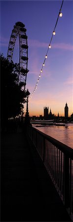 simsearch:851-02961402,k - Looking along the Thames Path to the London Eye and The Houses of Parliament at dusk,London,UK. Foto de stock - Con derechos protegidos, Código: 851-02961642