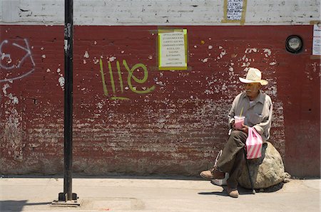 Maxican man sitting along wall,Oaxaca,Oaxaca State,Mexico Stock Photo - Rights-Managed, Code: 851-02961868
