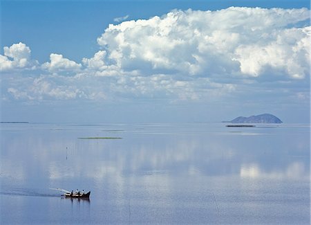 Bateau de pêche regagner Connolly île dans le lac Chilwa, Malawi Photographie de stock - Rights-Managed, Code: 851-02961999