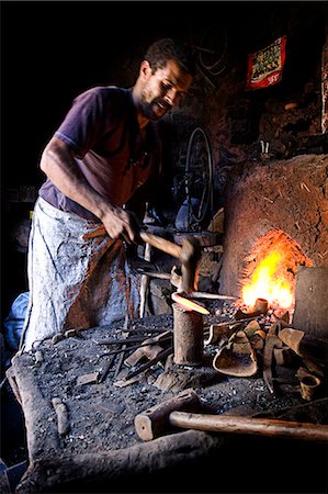 Welder working in village in Atlas Mountains,Morocco Stock Photo - Rights-Managed, Code: 851-02962092