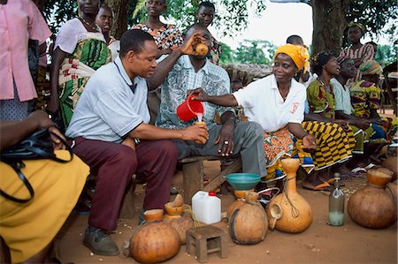 Pouring palm wine on a palm plantation,Nigeria Stock Photo - Rights-Managed, Code: 851-02962411