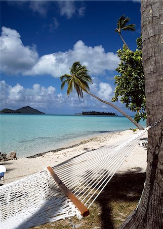 Hamac et palm tree - Pearl Beach, Bora Bora, Polynésie française. Photographie de stock - Rights-Managed, Code: 851-02962694