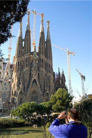 Tourist taking pictures of Sagrada Familia,Barcelona,Spain Stock Photo - Rights-Managed, Code: 851-02963047