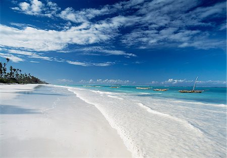 Looking along Matemwe beach towards Mnemba Island,Zanzibar,Tanzania. Stock Photo - Rights-Managed, Code: 851-02963360