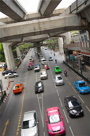 reisebüro - Verkehr auf der stark befahrenen Straße unterhalb Rampenbrücken, Bangkok, Thailand Stockbilder - Lizenzpflichtiges, Bildnummer: 851-02963418