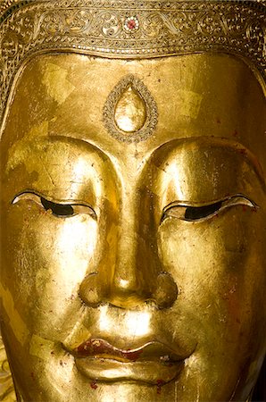 Buddha in stupa at Wat Nuang Bua,Ubon Ratchathani,Isan,Thailand Fotografie stock - Rights-Managed, Codice: 851-02963485