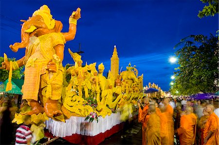 Procession of wax floats at stret feslival,Ubon Ratchathani,Thailand Fotografie stock - Rights-Managed, Codice: 851-02963501